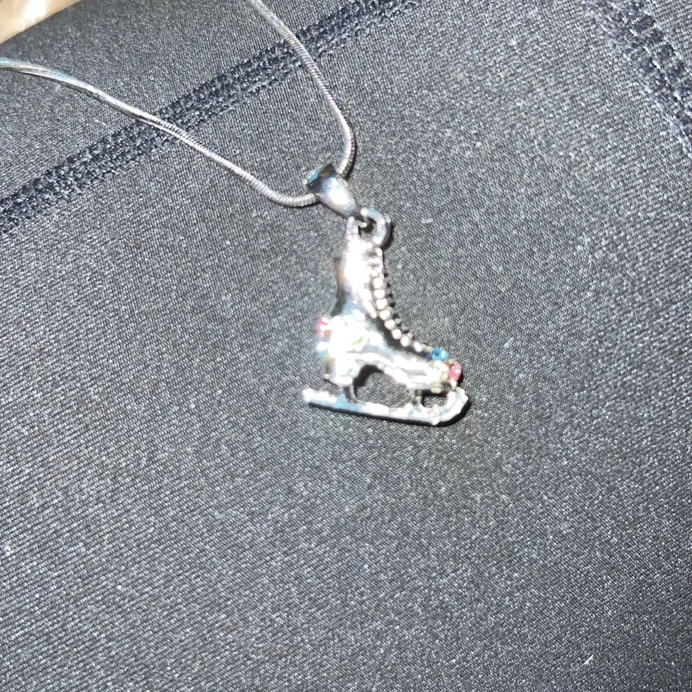 Silver skating necklace, penguin earrings and barrette